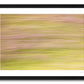 a framed fine art photographic print of a road side verge with blurred green grass and wild summer flowers