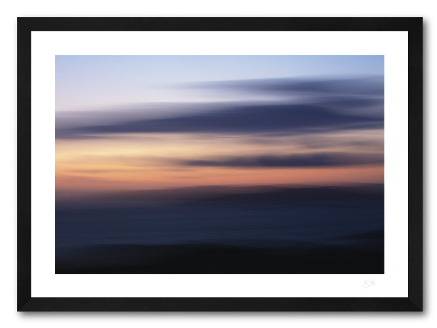 a framed fine art photograph using intentional camera movement of a beautifully coloured twilight sky over Arranmore island in Donegal