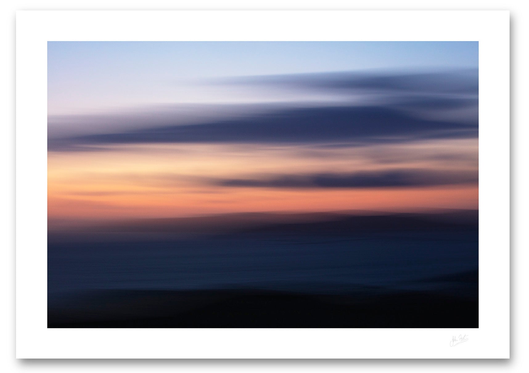 an unframed fine art photograph using intentional camera movement of a beautifully coloured twilight sky over Arranmore island in Donegal