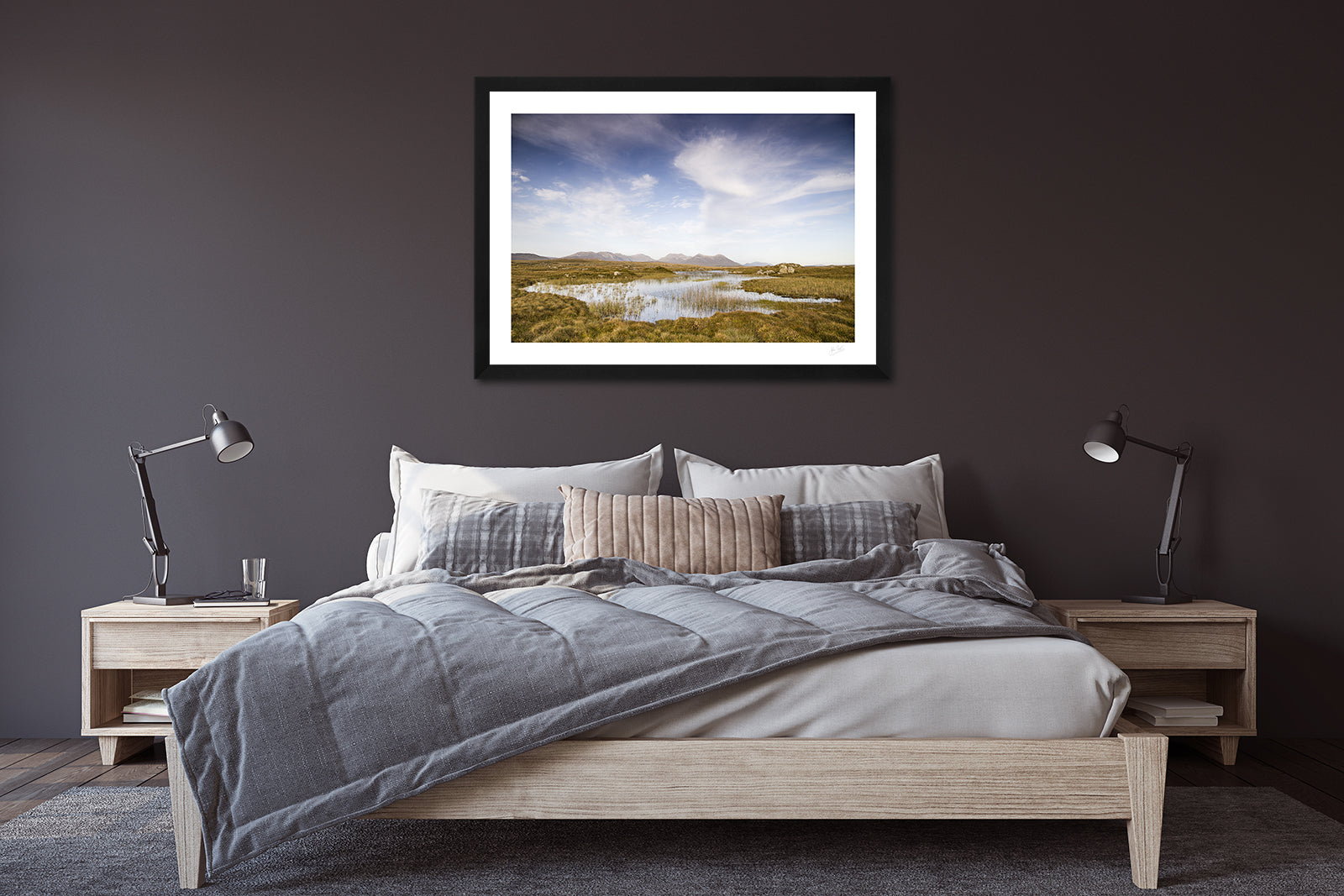 a framed fine art photographic print of the spectacular Bog Road in Connemara on a beautiful Autumn evening, hanging above a bed