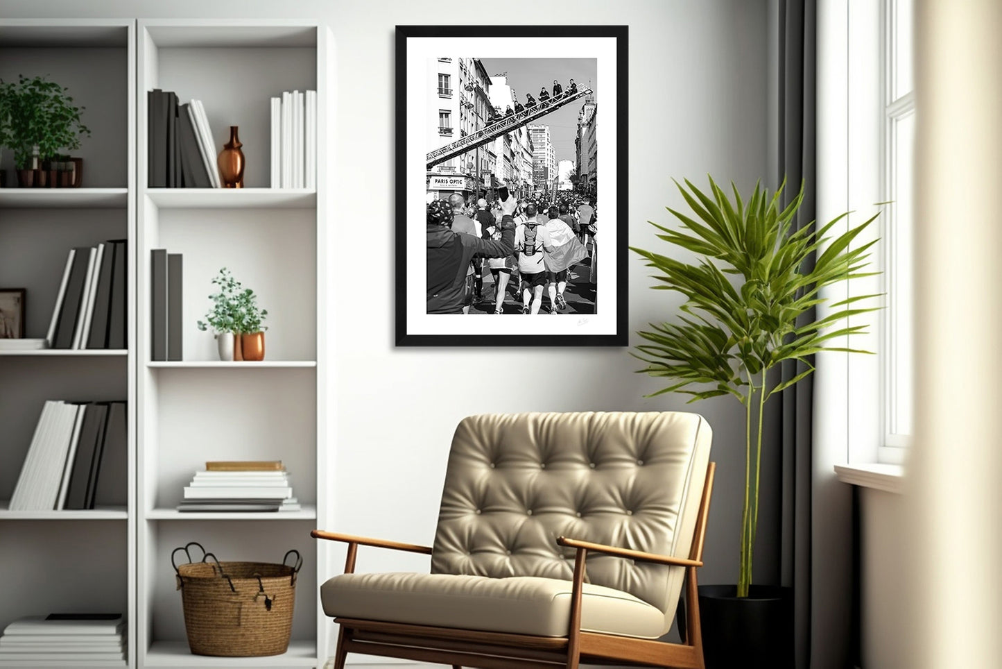 a framed fine art photographic print of Parisian firemen sitting on a ladder above a Paris street during the Paris Marathon to support the runners, hanging on a wall in a living room