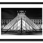framed black and white fine art print of the pyramids at the side entrance to the Louvre Museum lined up in perfect symmetry