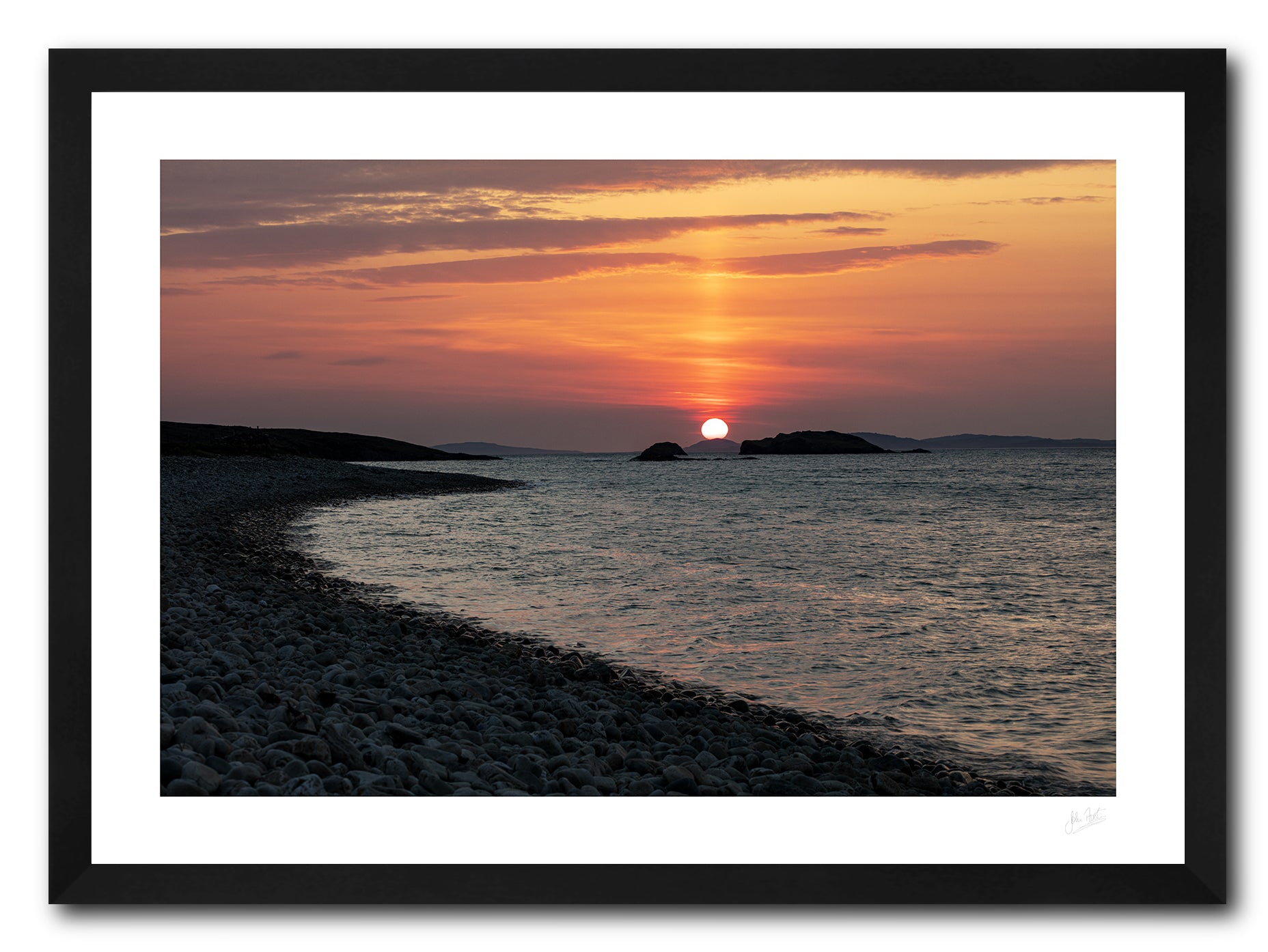 a framed fine art photographic print of a beautiful sunset from a silhouetted Ross Beach in Connemara as the sun sets behind Inishbofin Island available to buy online