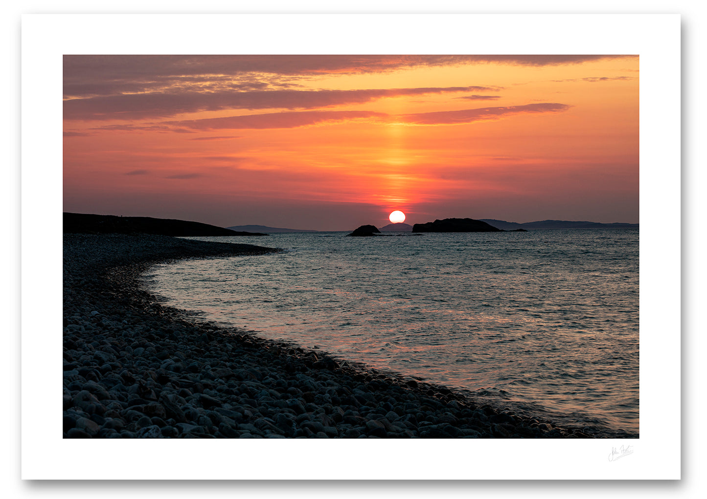 an unframed fine art photographic print of a beautiful sunset from a silhouetted Ross Beach in Connemara as the sun sets behind Inishbofin Island available to buy online