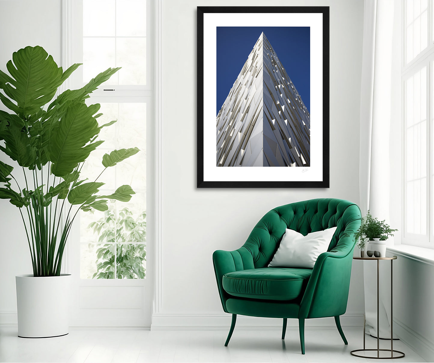 a framed fine art photographic print of the spectacular facade of the Titanic Experience in Belfast, Northern Ireland, hanging on a wall above a chair in a living room